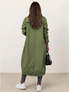 sleek minimalist oversized hooded coat for travel in breathable polyester blend