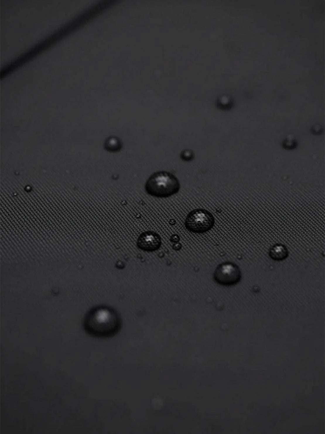 Elegant water-repellent A-line hooded raincoat with matching belt and insulated lining