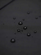 Elegant water-repellent A-line hooded raincoat with matching belt and insulated lining