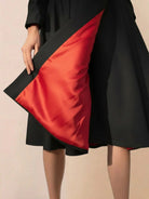 Elegant water-repellent A-line hooded raincoat with belt and insulated lining for women