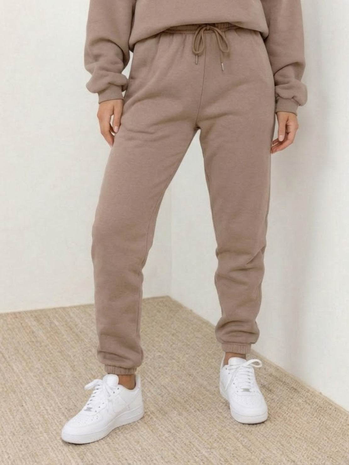 Woman wearing Classic Comfort Athleisure set in stylish black activewear with versatile fit