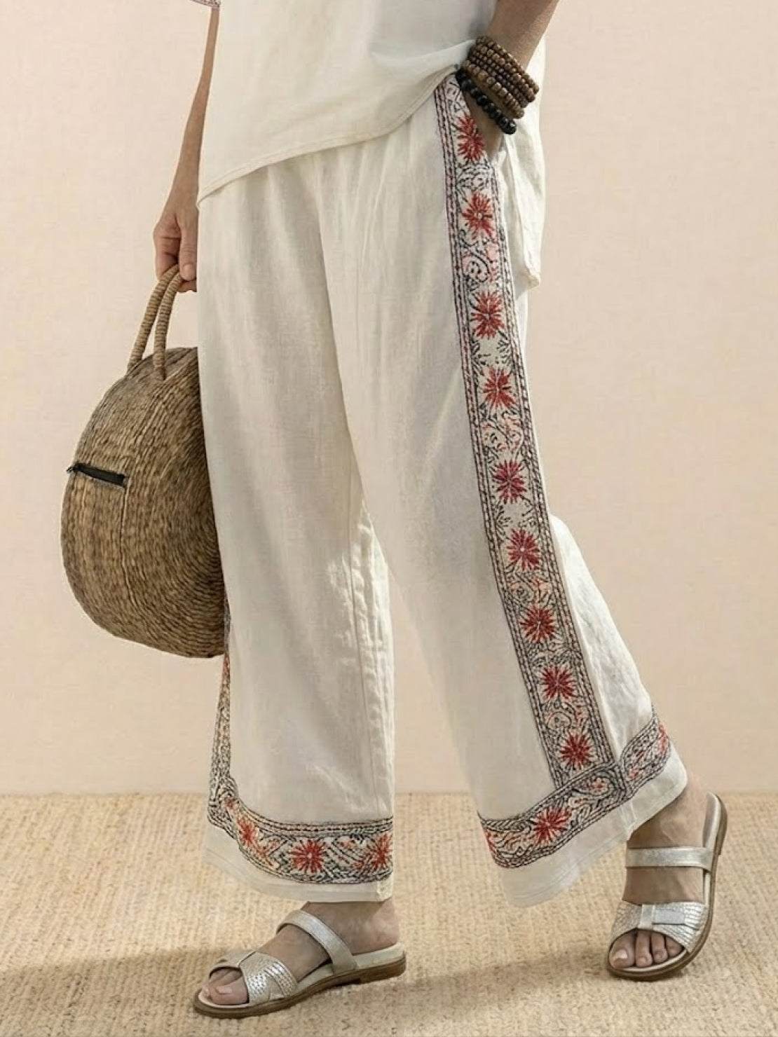 Coastal Comfort Linen two-piece set with lace details and breathable fabric on model by the sea