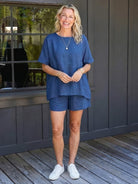 Comfy linen-like shirt and shorts two-piece set in breathable, lightweight fabric for casual and versatile wear