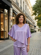 Elegant Layers Two-Piece Set with layered V-neck top and matching pants in soft, wrinkle-resistant fabric