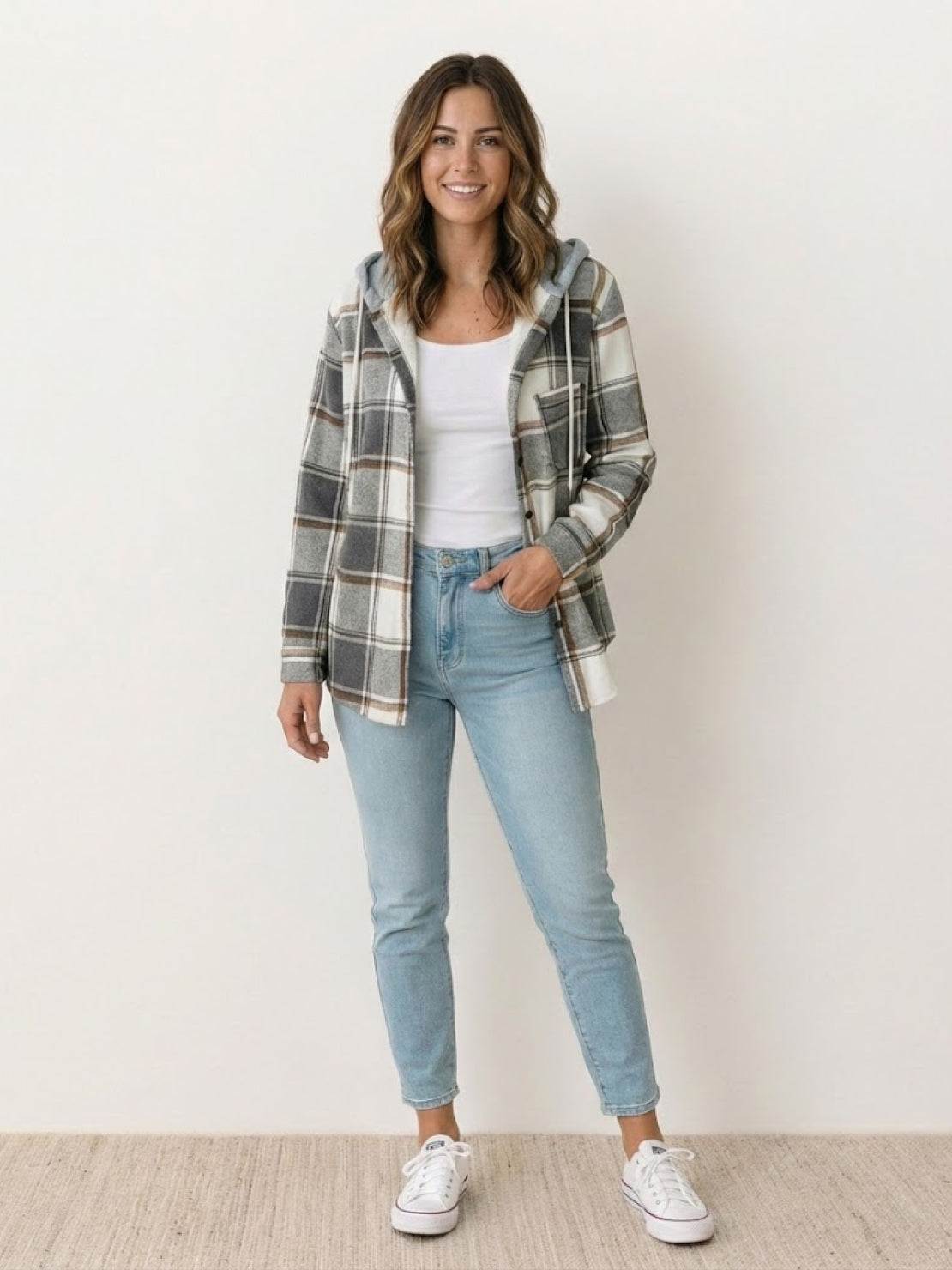 Highland Plaid Shacket with relaxed fit, soft fleece lining, attached hood, button-front, and plaid pattern for cozy cool-weather layering