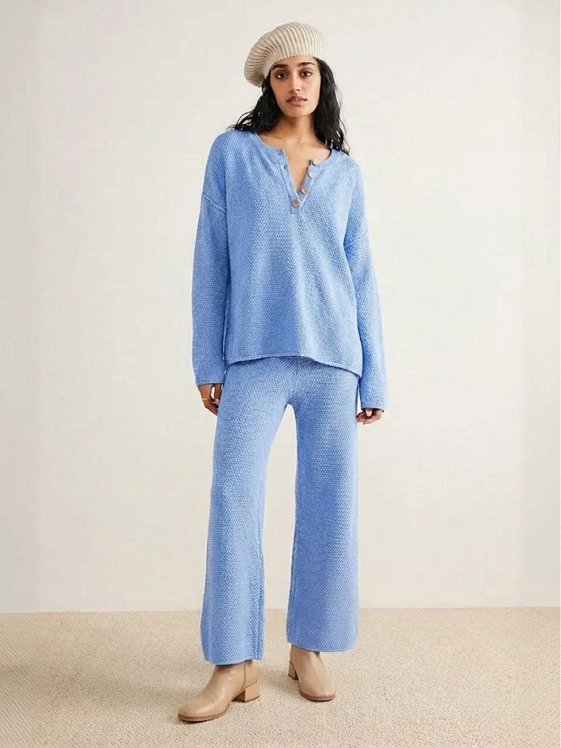 Woman wearing multi-weather comfort two-piece oversized set with relaxed fit and wide cropped pants
