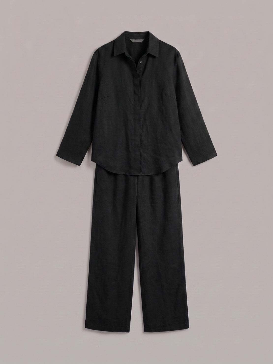 Model wearing an oversized 100% cotton shirt and wide-leg pants co-ord set in a relaxed, breathable outfit