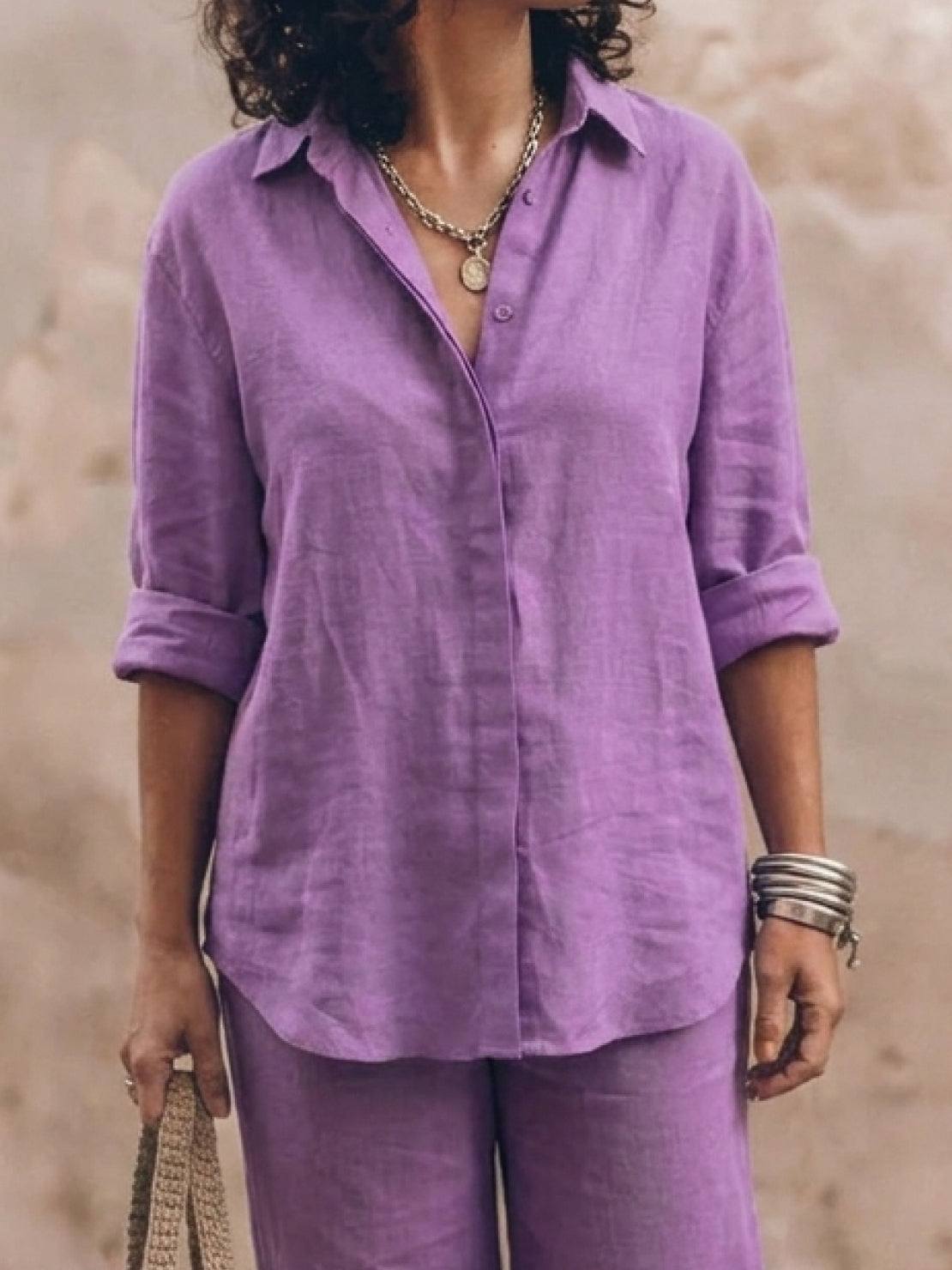 Model wearing oversized 100% cotton shirt and wide-leg pants co-ord set in neutral tone