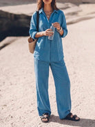 Woman wearing oversized 100% cotton shirt and wide-leg pants co-ord set in relaxed style
