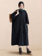 One size fits all oversized black water-resistant windbreaker jacket with waterproof design and attached hood