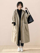 One size oversized water-resistant windbreaker jacket with hood and large pockets in beige waterproof design