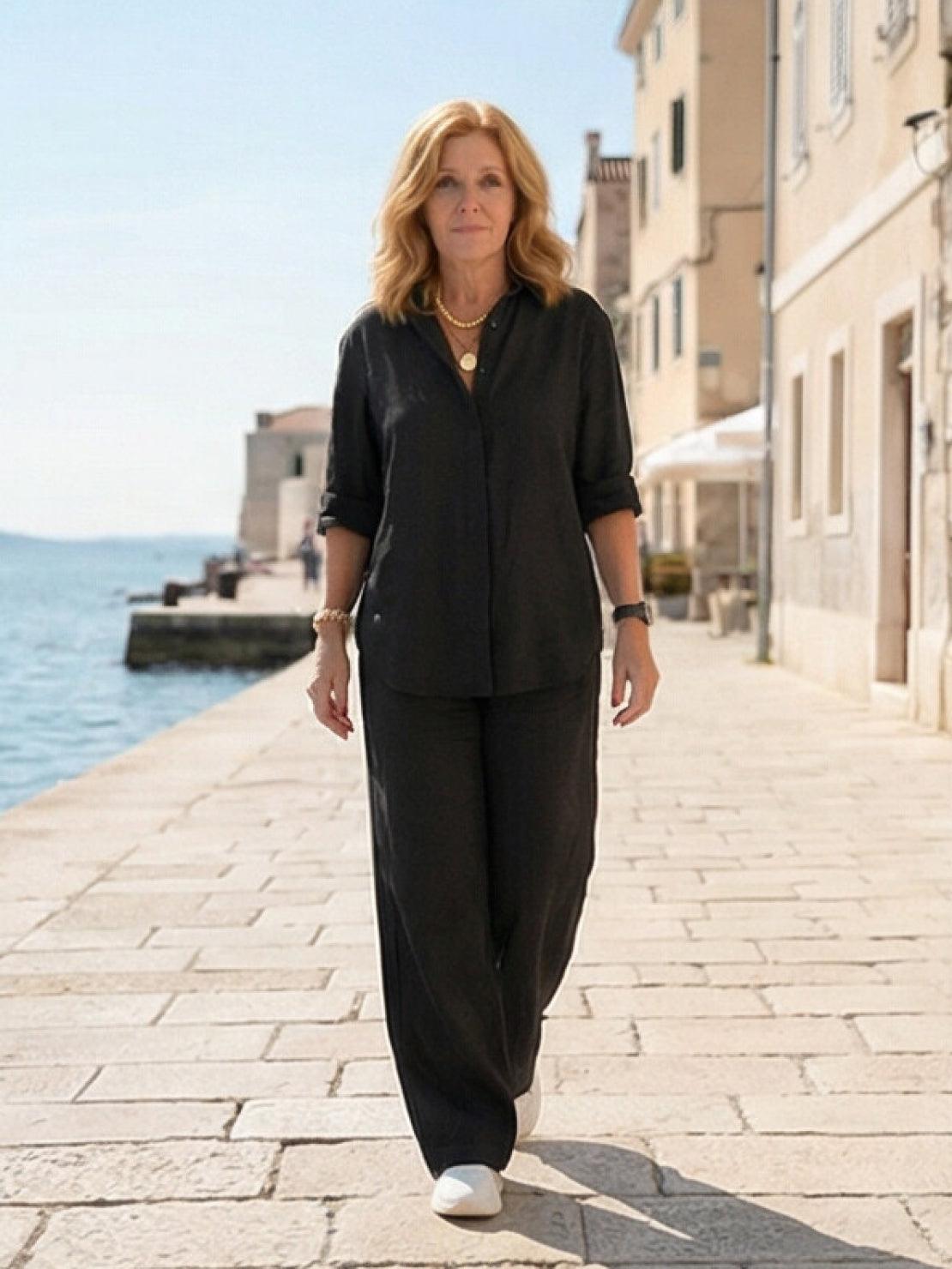 Model wearing oversized 100% cotton shirt and wide-leg pants co-ord set in relaxed style