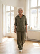 Model wearing oversized 100% cotton shirt and wide-leg pants co-ord set in relaxed silhouette