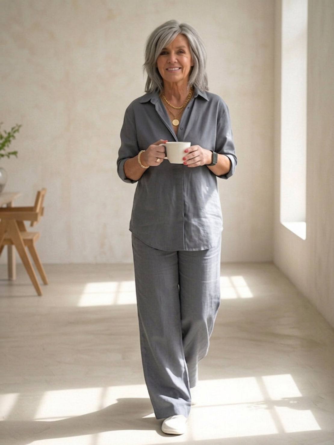 Woman wearing oversized 100% cotton shirt and wide-leg pants co-ord set in a relaxed, stylish fit