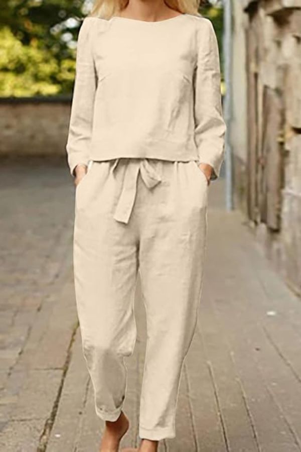 Woman wearing relaxed cotton-linen monochrome longline top and wide-leg pants set on street