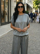 Silken Escape satin two-piece set with flowy top and wide-leg pants in silky fabric