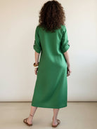 White Pure Cotton Elegance dress with soft linen-like texture on hanger