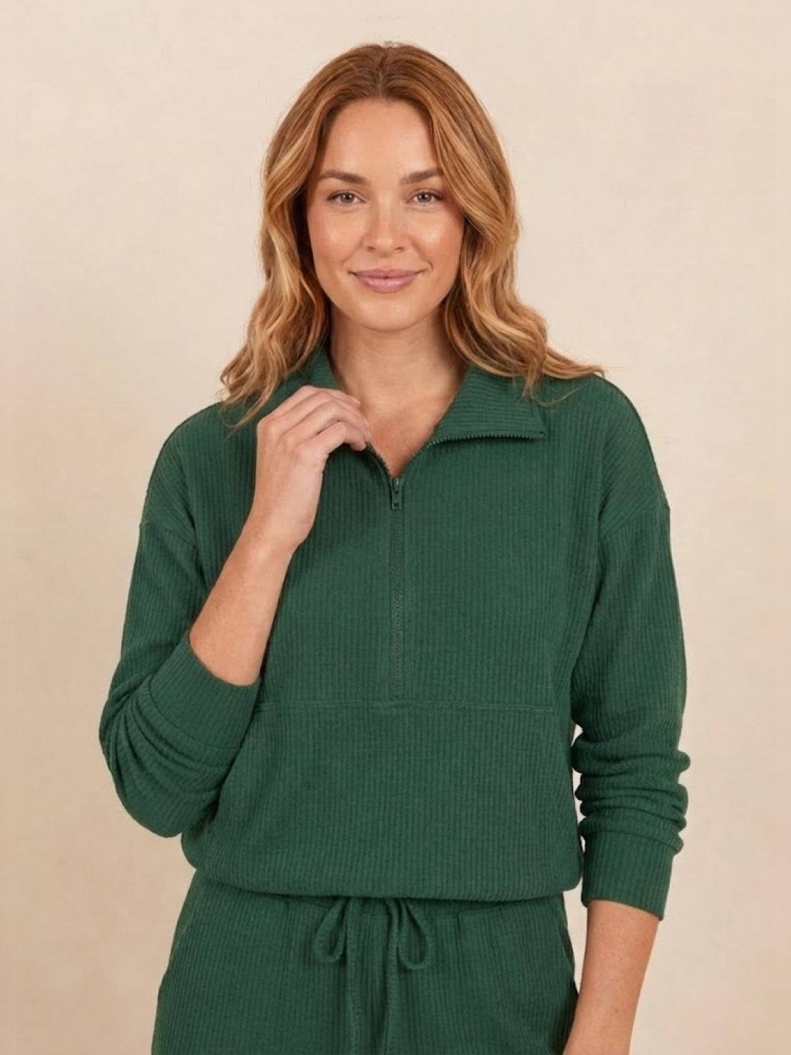 Unisex half-zip pullover and sweatpants set in relaxed fit and soft fabric for everyday comfort and casual wear