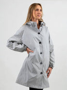 Water-resistant oversized hooded windbreaker rain jacket in high-quality polyester for outdoor protection and style